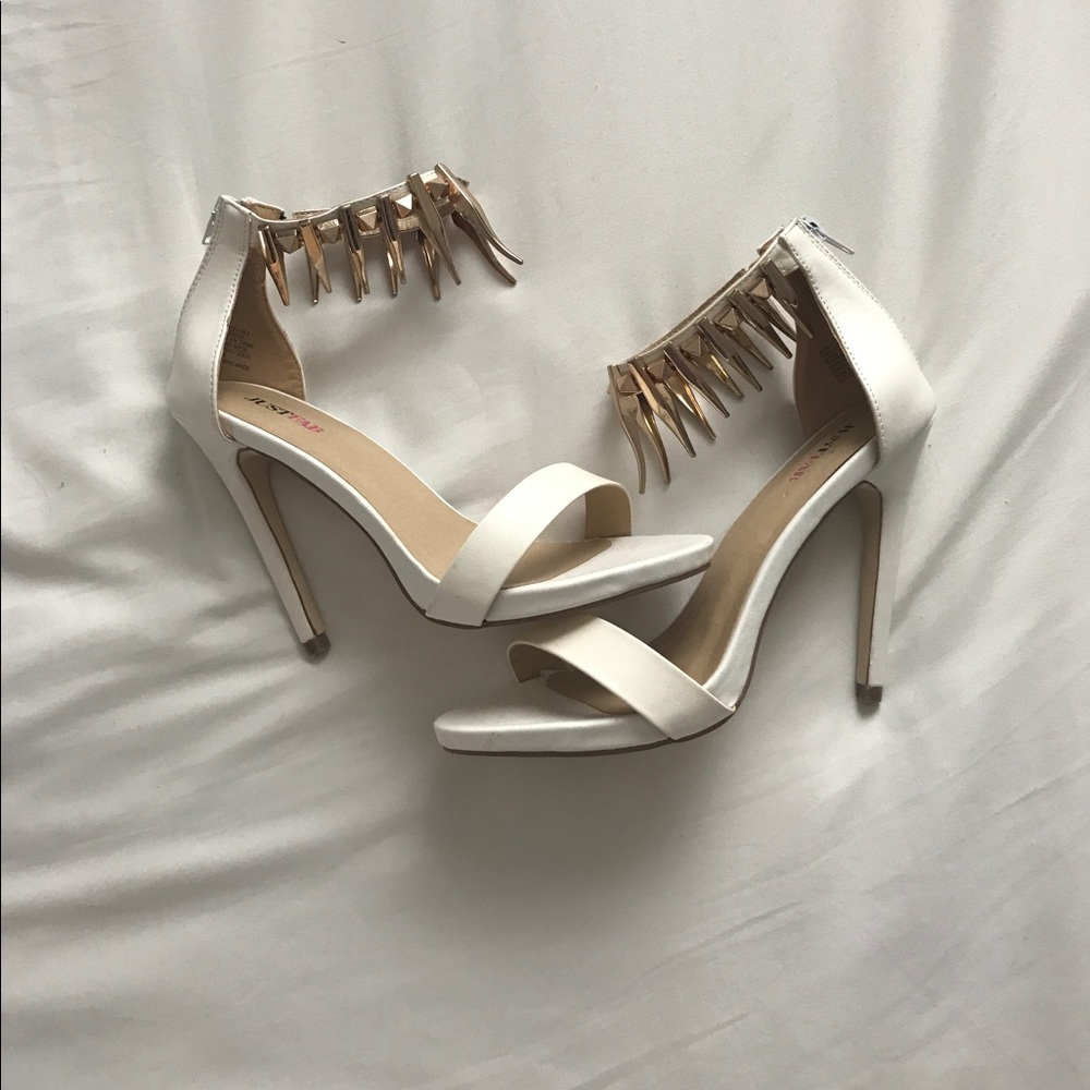 White heels with gold embellishment!