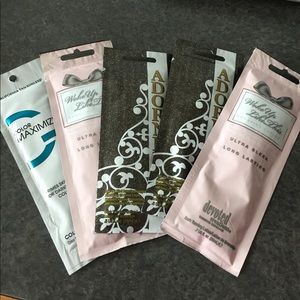 Five packets of tanning lotion!