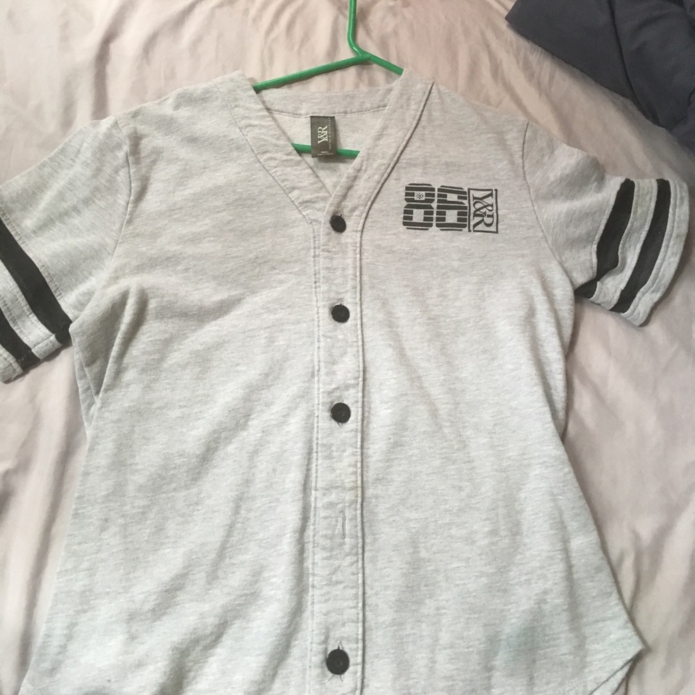 A Grey and black tee