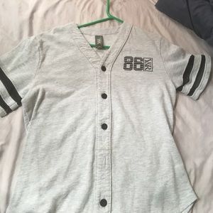 A Grey and black tee