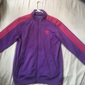 A purple and red adidas sweater