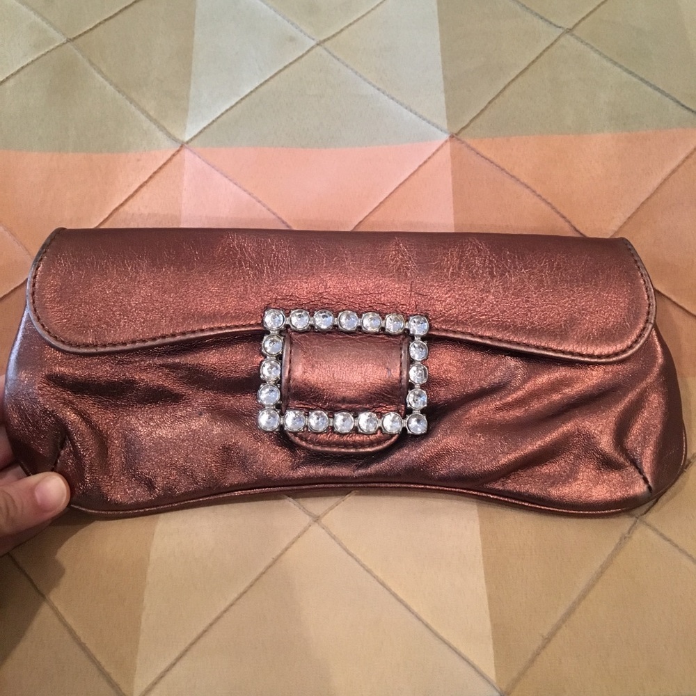Bronze buckle clutch