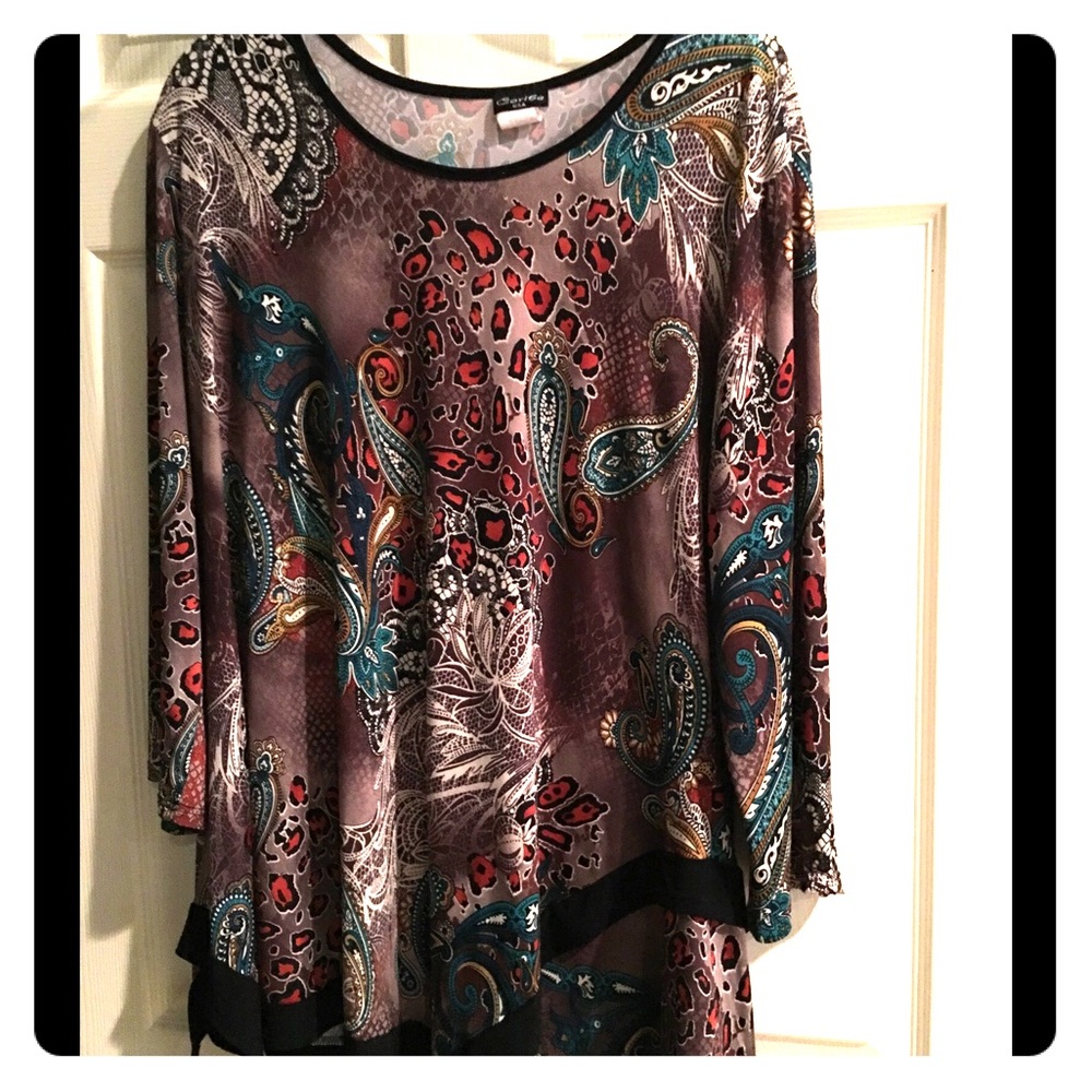 Tan paisley print, black trim and orange accents.