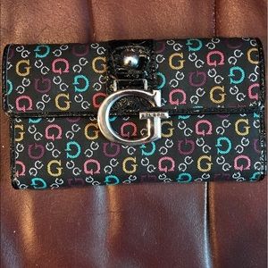 Guess wallet with check book holder.