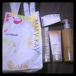 Mary Kay satin hands set with storage bag.