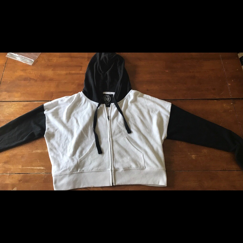 White zip up hoodie w/ black sleeves