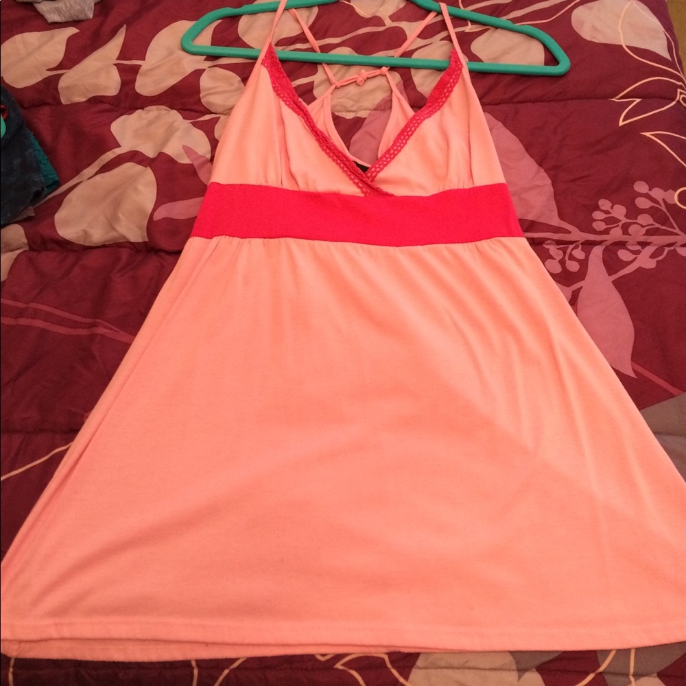 Pink flowing tank top.