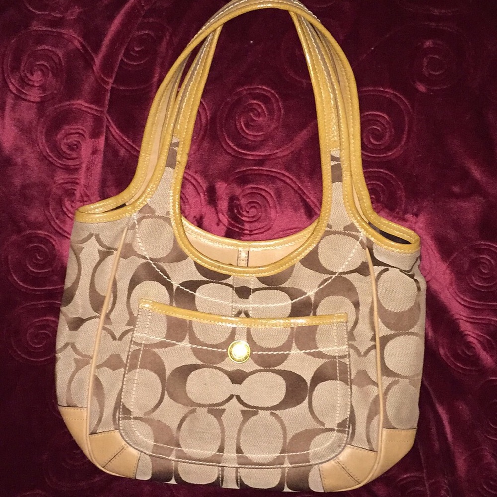 Medium size authentic Coach Bag.