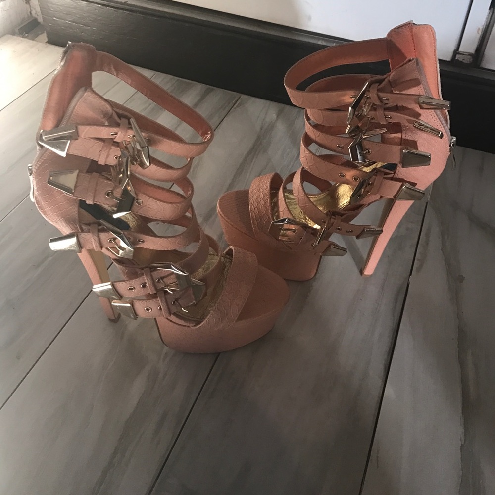 Peachy colored heels with gold buckle detail