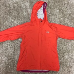 Coral colored rain jacket