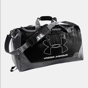 Black and grey UnderArmour duffle bag
