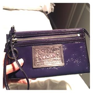 Purple patent leather Coach wristlet