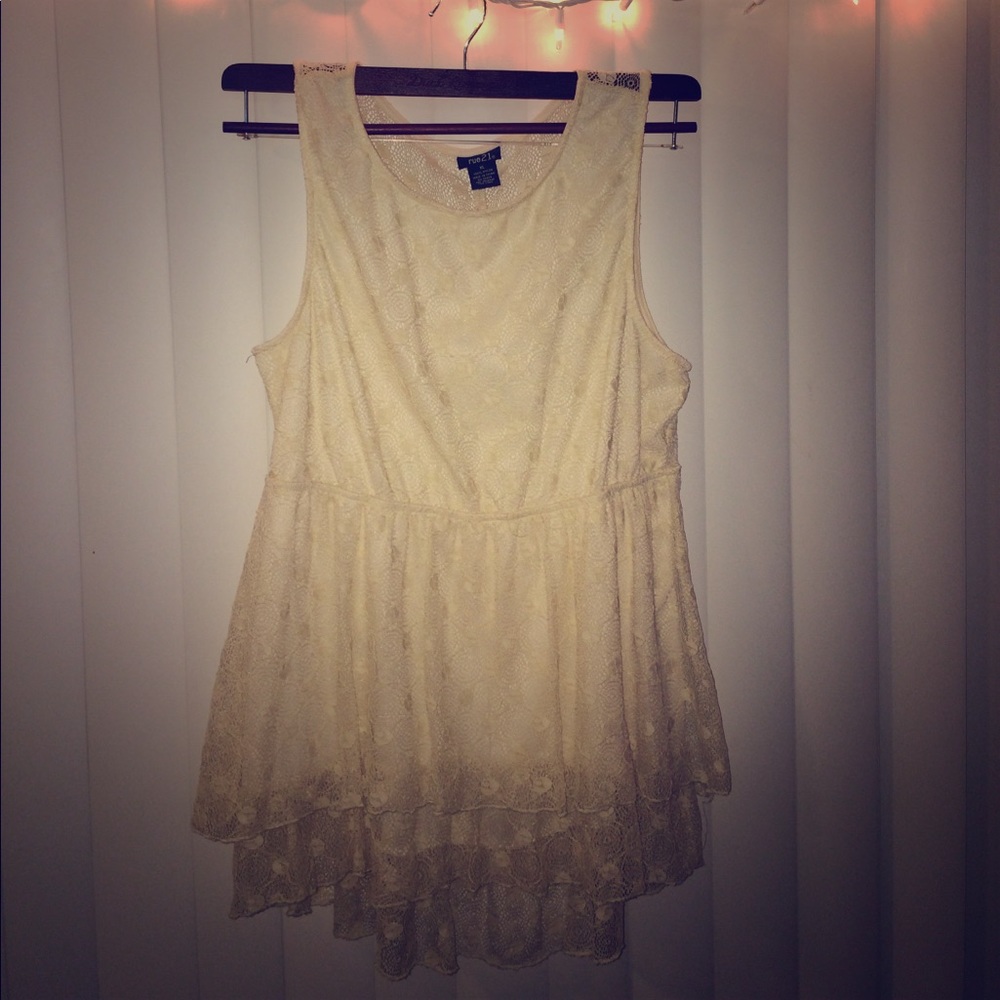 Beautiful lace sleeveless blouse with flattering