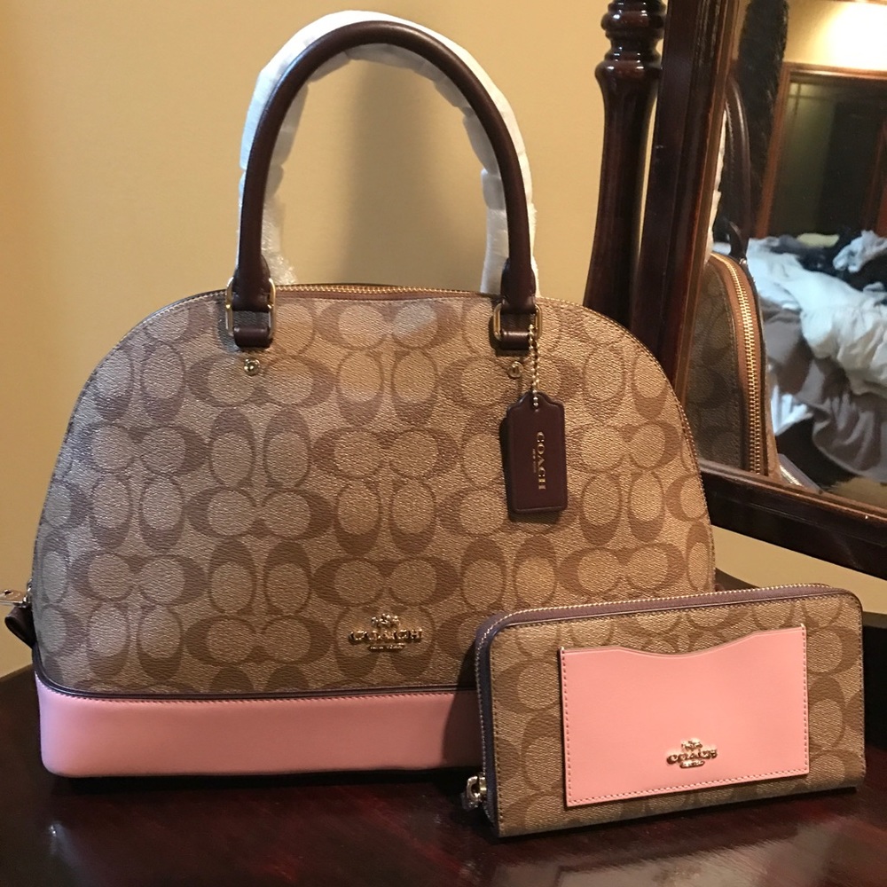 Coach bag with matching wallet.