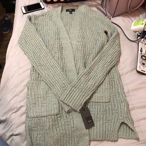 Teal long sleeve cartigan.