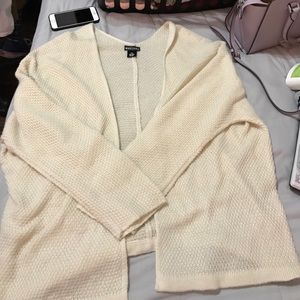 Cream cartigan lightweight. Low back long front