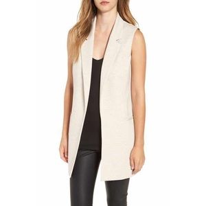 Sleeveless tan blazer