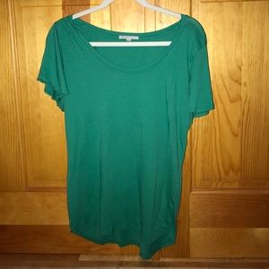 Green crew neck shirt.