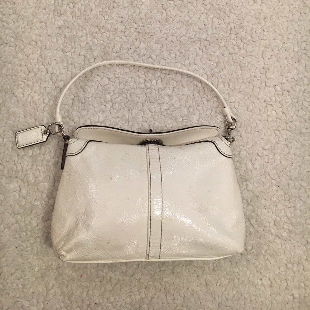 Coach clutch/wristlet