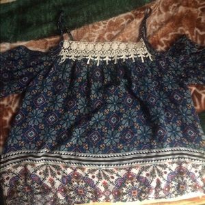 Flowy off the shoulder type of style shirt