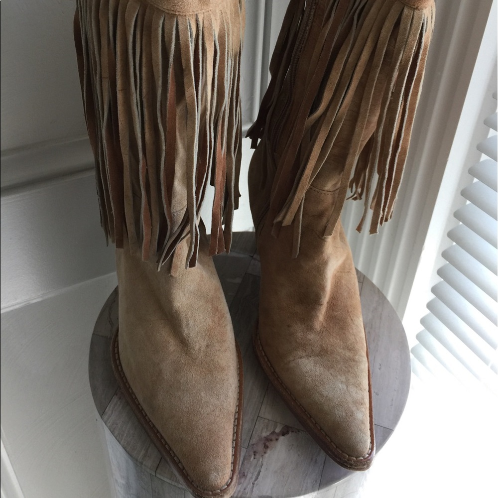 Faux suede tan fringe boots.