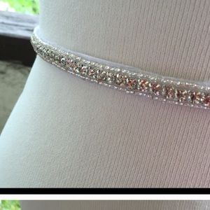 A sash and matching necklace