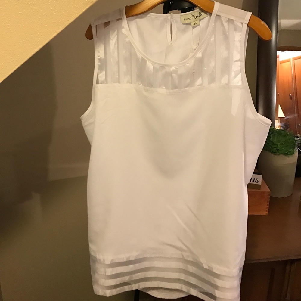White sleeveless top