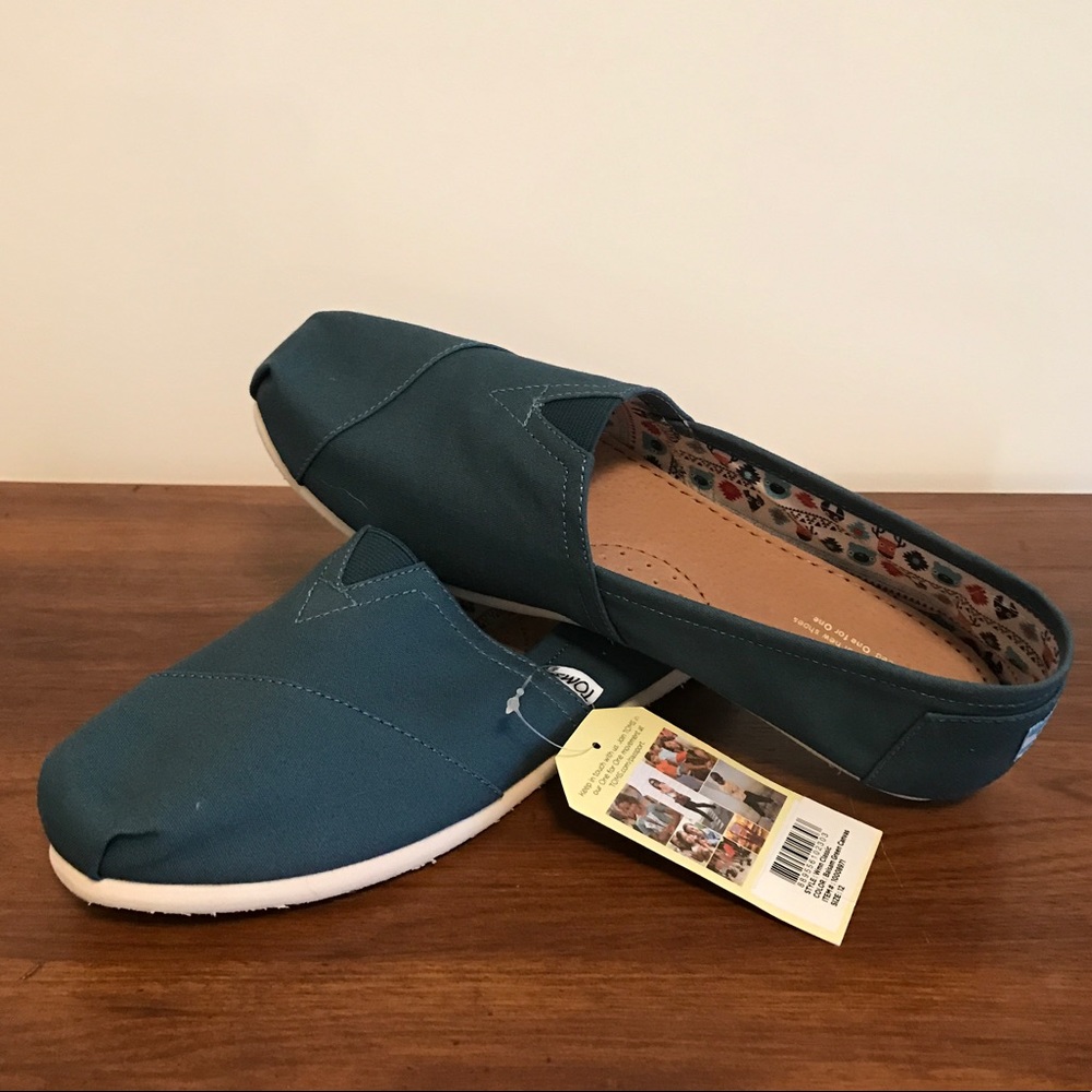 Women's size 12 teal Tom's slip on shoes