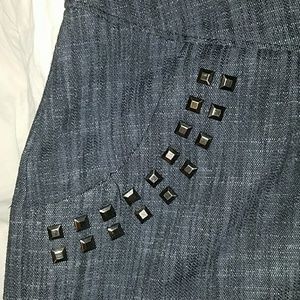 Denim mini skirt with studs