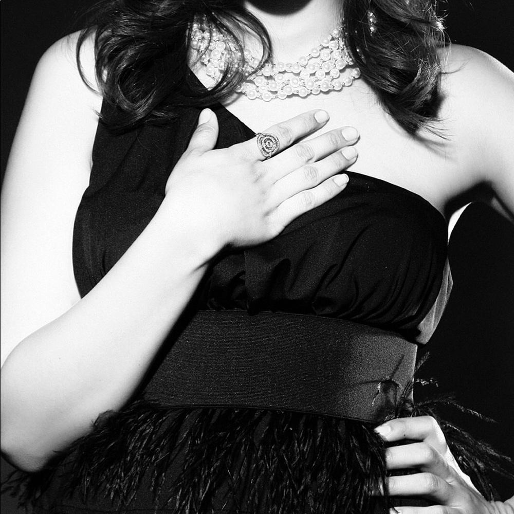 Asymmetrical Black Dress Featuring Feathered Skirt