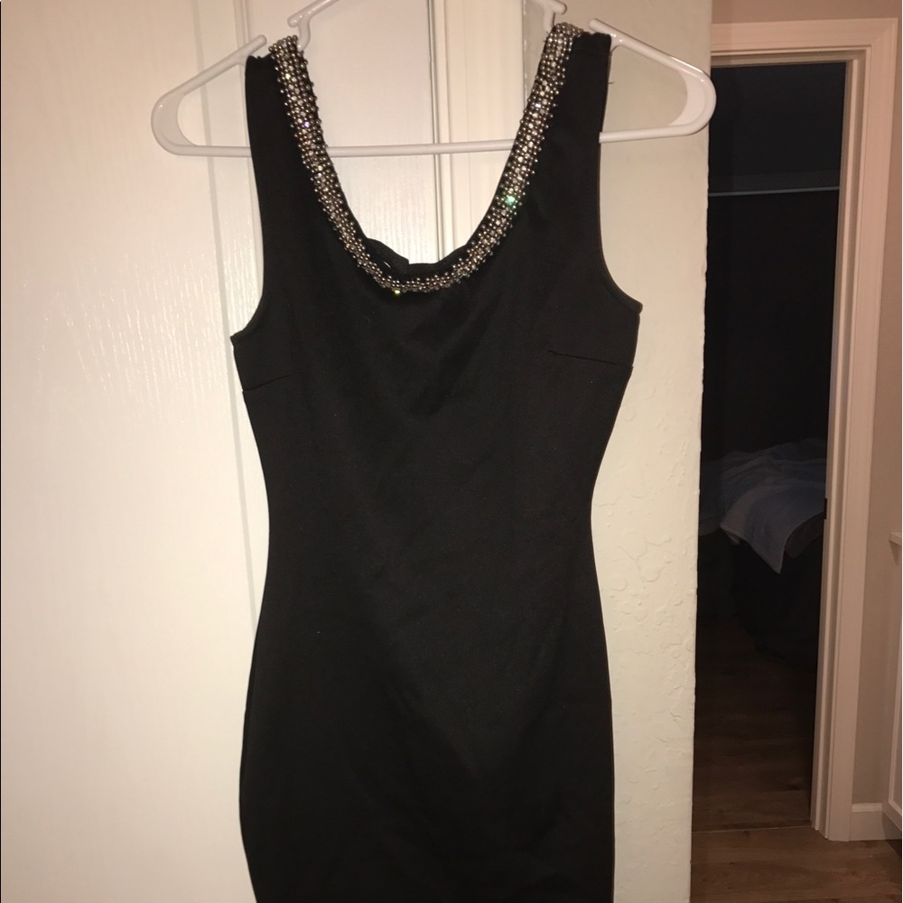 Mid-thigh dress, low cut back