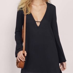 Black deep V mini dress with bell sleeves