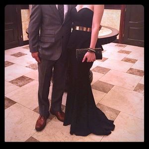 Evening gown in black with gold belt