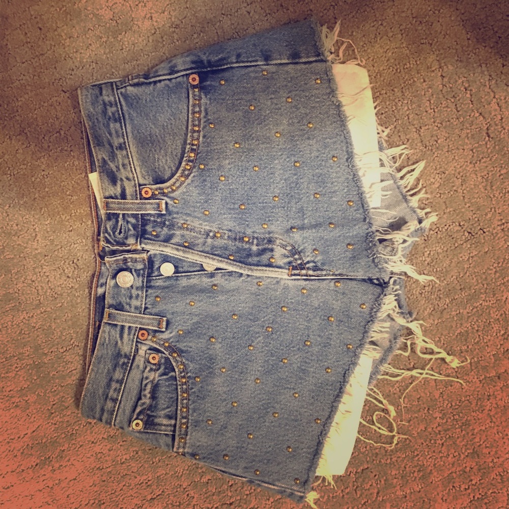 Levi's gold studded shorts