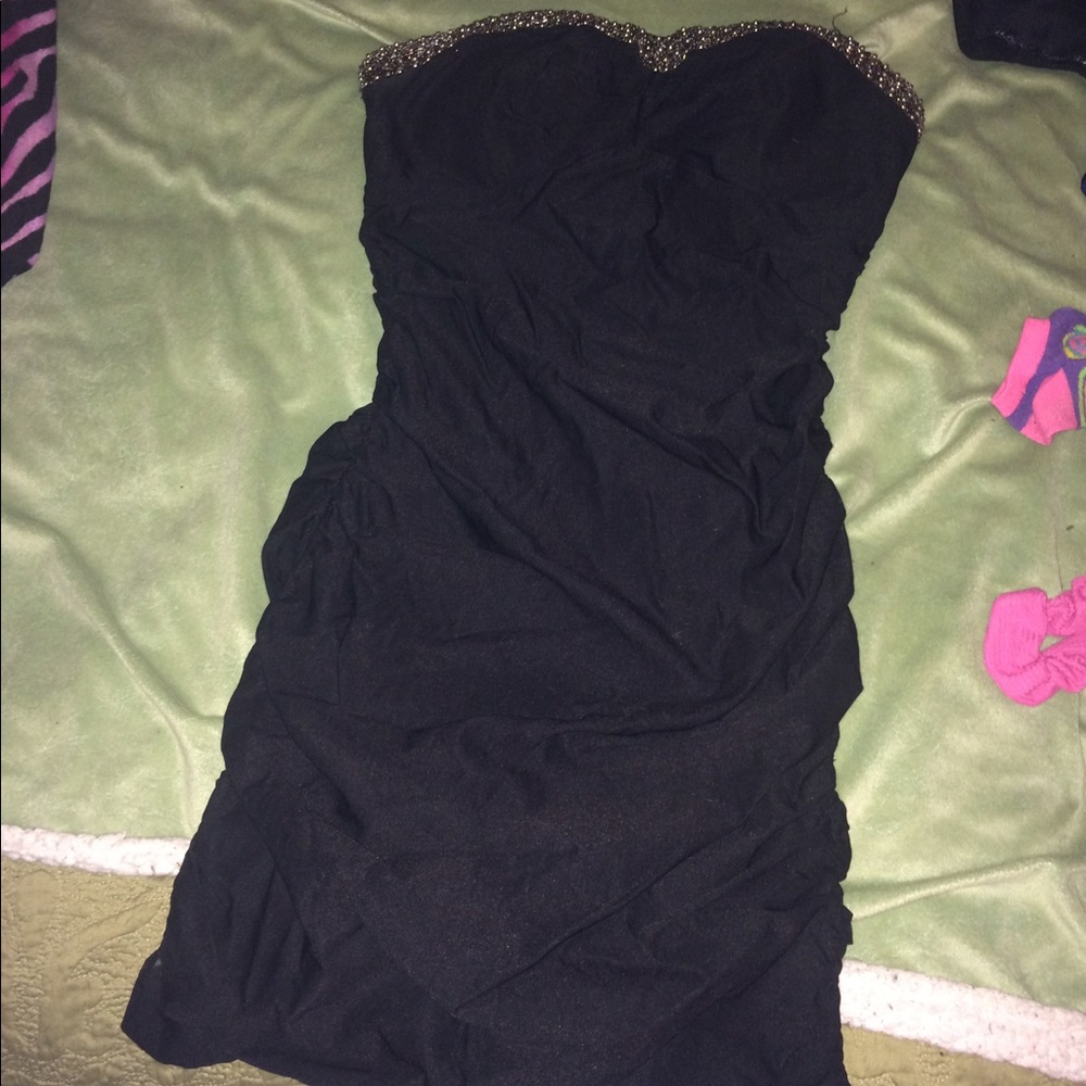 Black tight dress with zipper in back