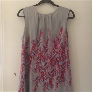 Grey sleeveless dress with foral detailing