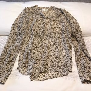 Tan and black blouse