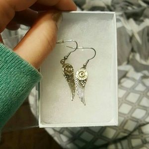 Bullet wings earrings.