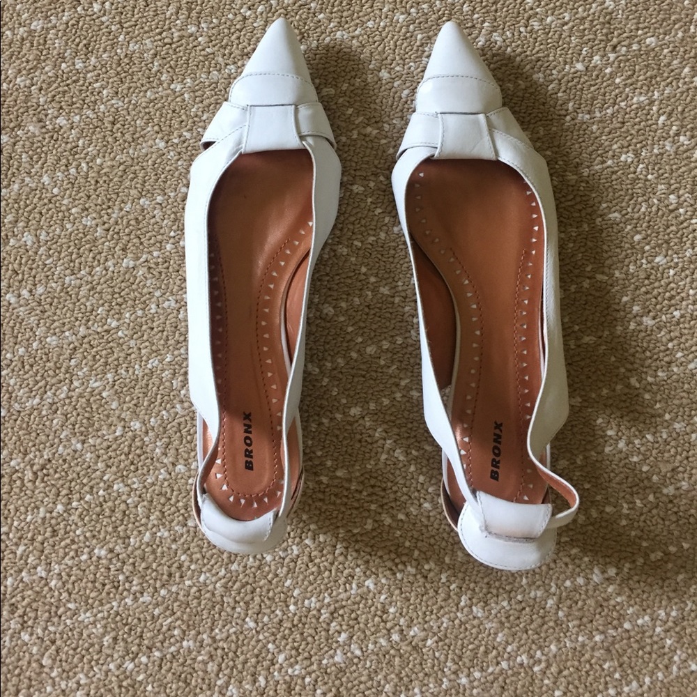White flat shoes