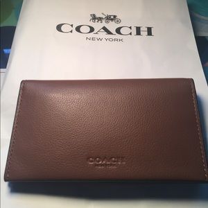 Coach iPhone 6/7 case wallet. Dark saddle leather.
