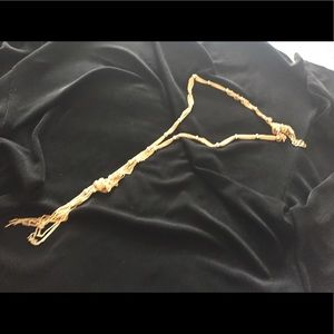 Long gold necklace