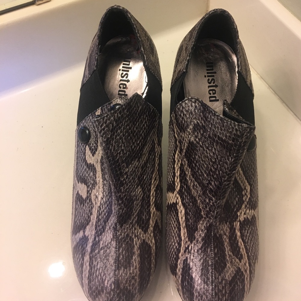 Black and gray animal print shoes