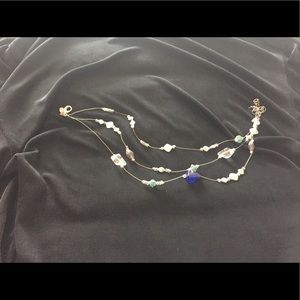 Necklace with blue and clear crystals