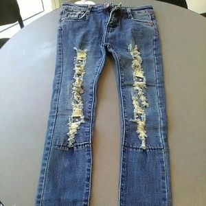 Ripped,studded skinny jeans