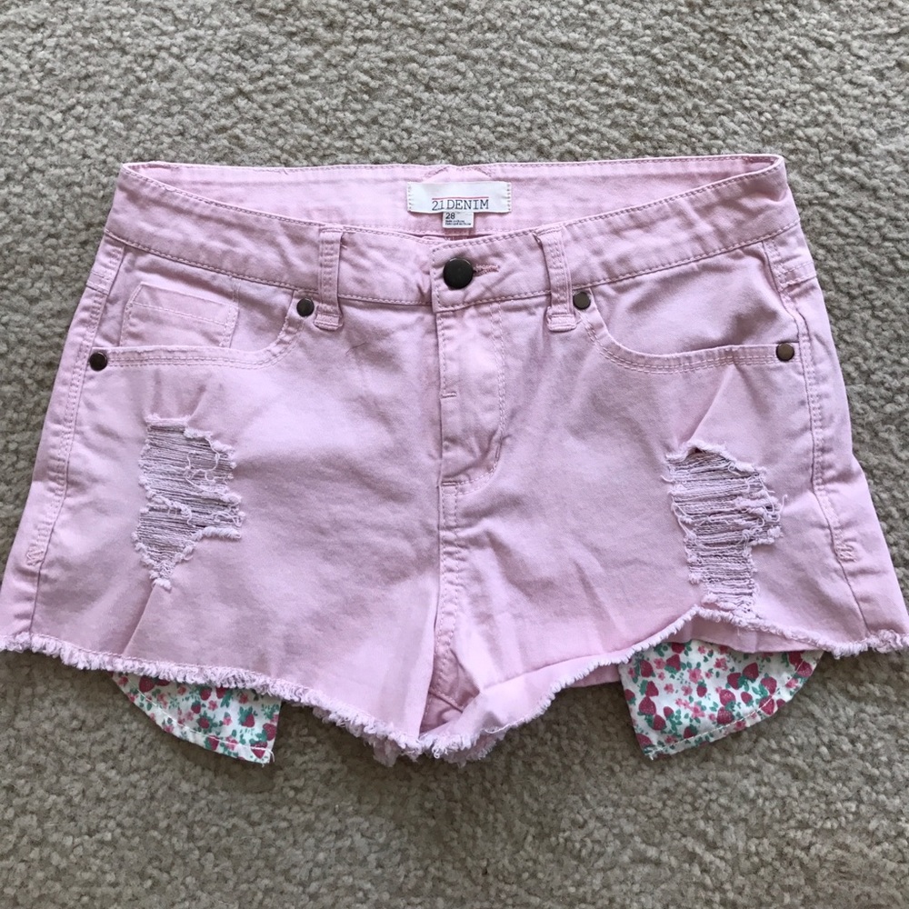 Soft pink shorts with raspberry peek-a-boo pockets