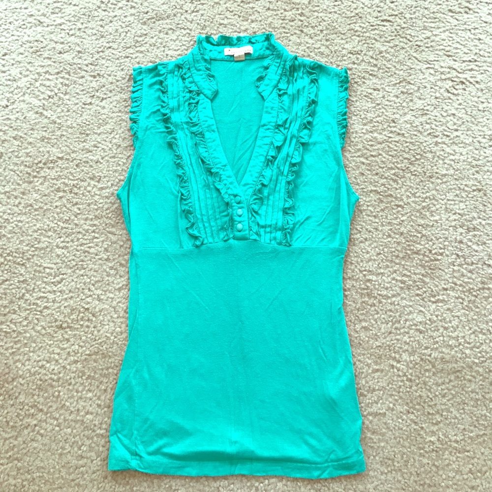 Mint green tank top with plunging ruffled neckline