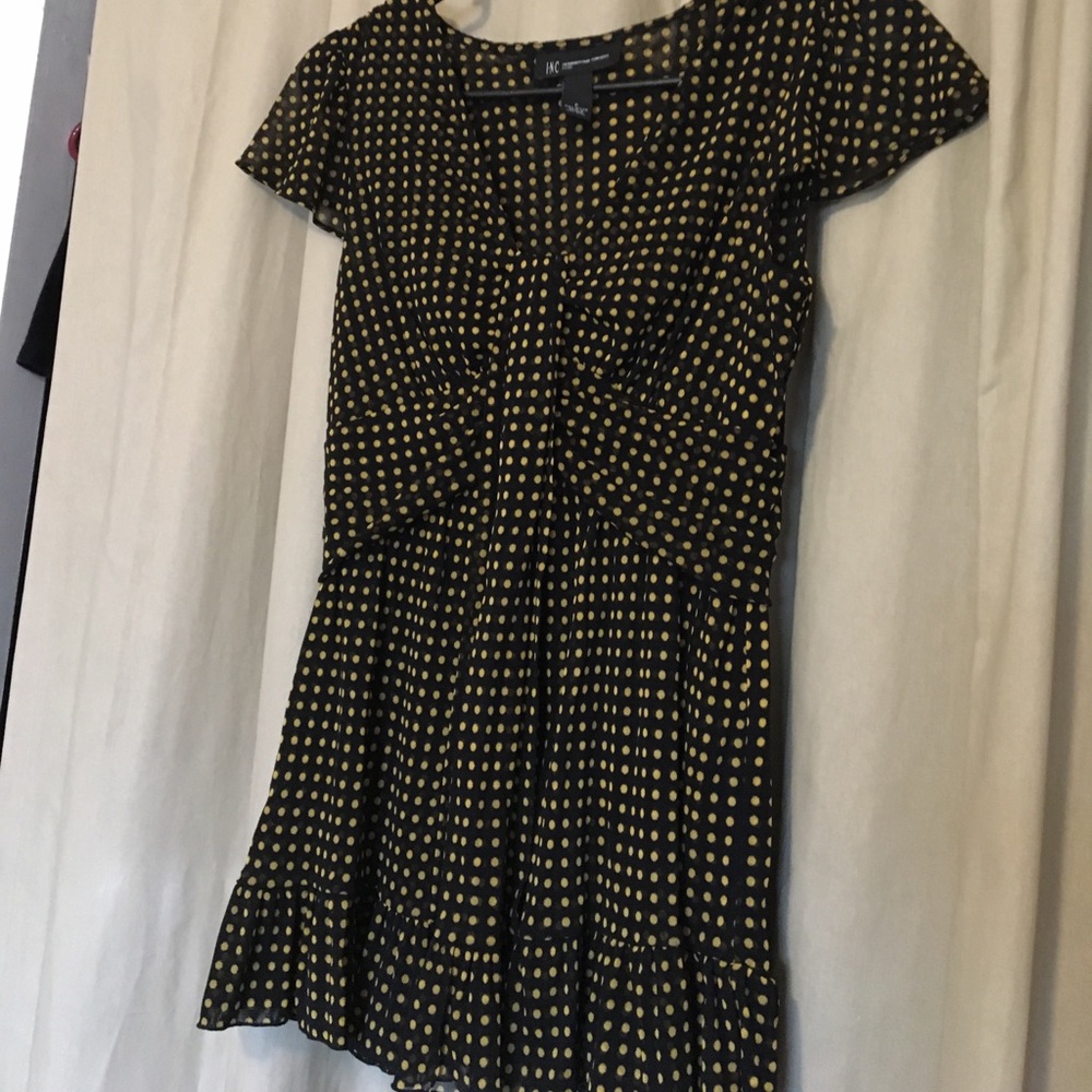 Black short sleeve top with mustard polkadot