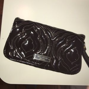 Dark purple kate spade wristlet