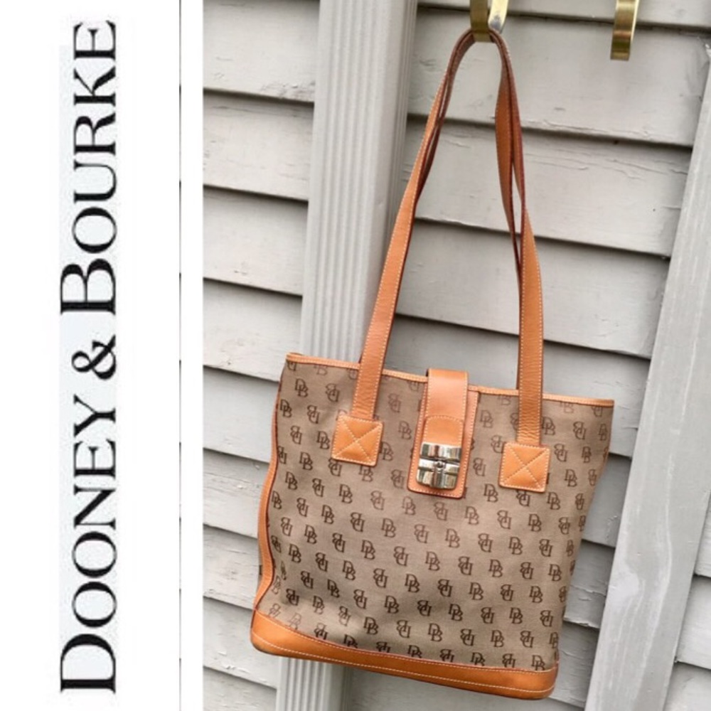 Authentic Dooney and Bourke cross body Bucket bag