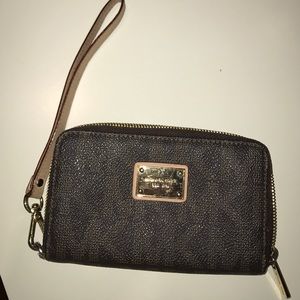 Michael Kors wristlet, new condition